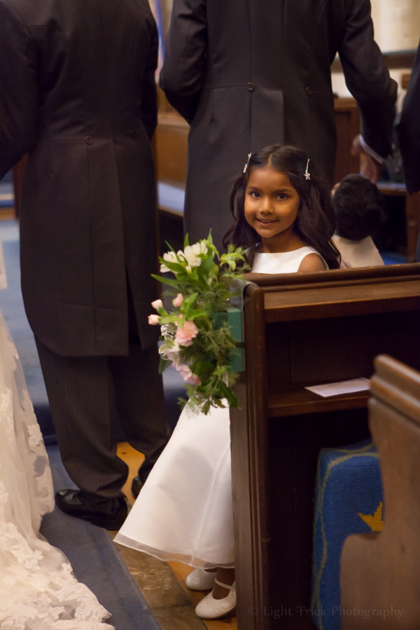cute Sri Lankan flower girl at church